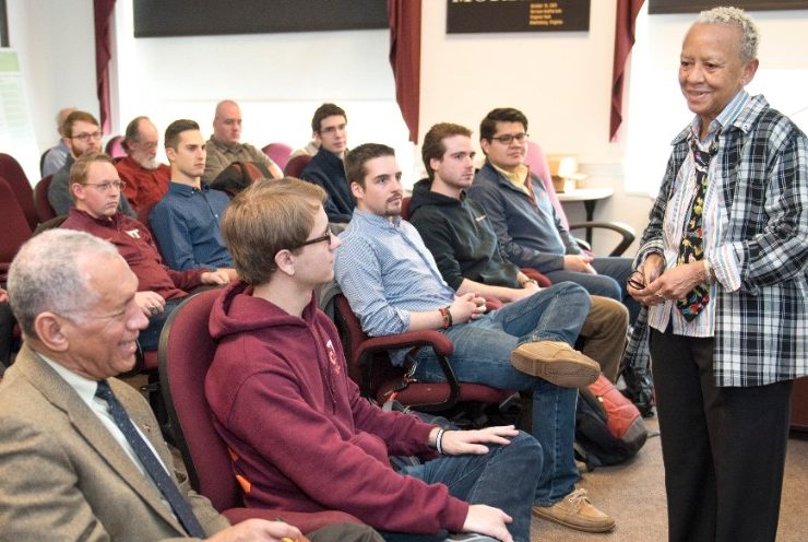 Faculty Senate meeting with a speaker